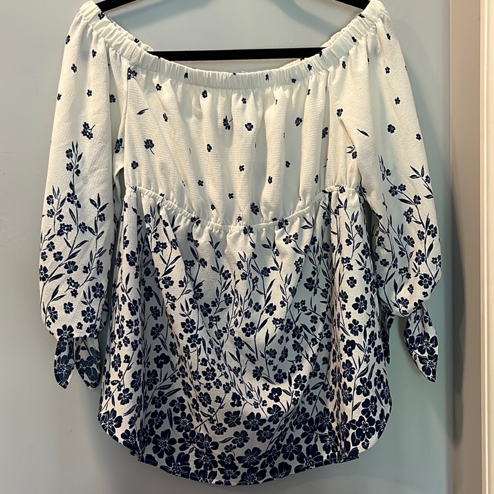 Like new, Medium, off-shoulder blue/white floral blouse with tie long sleeves